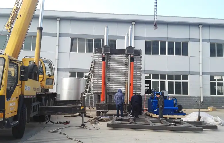 Personnel assembling the upper section of a vertical pressure filter