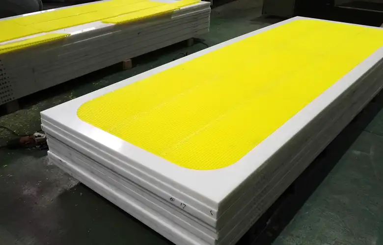Stacked pressure-filter plates with yellow diaphragms